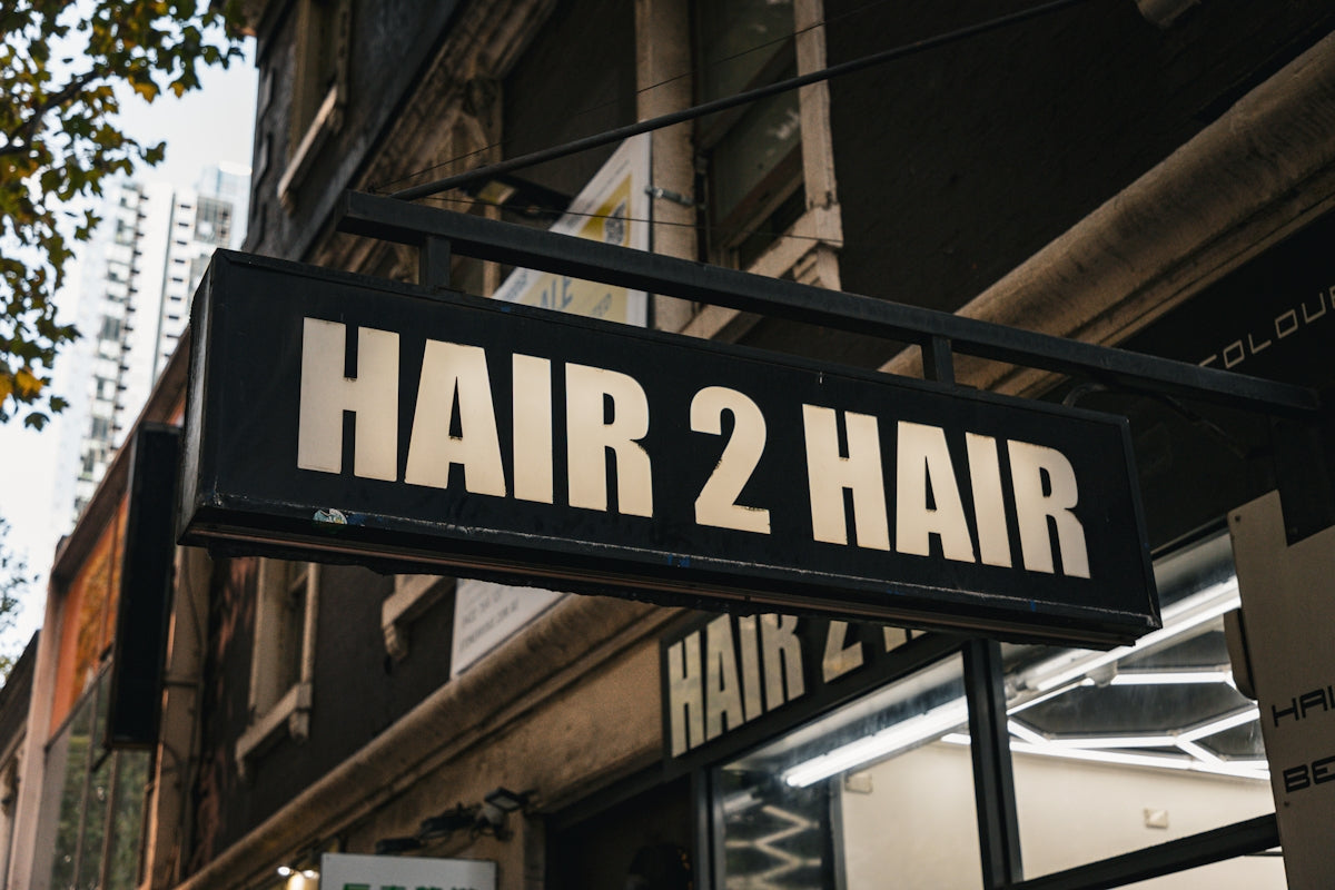Hair 2 hair salon sign is displayed.