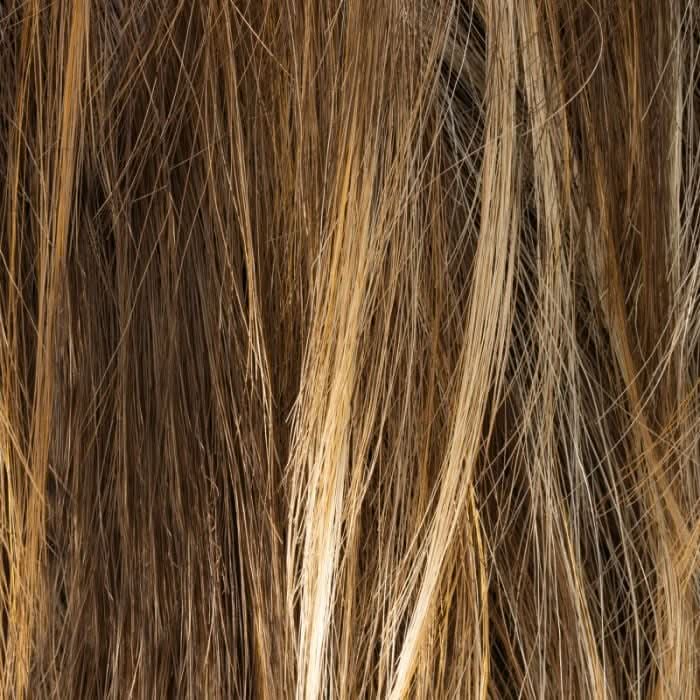 Farbton Mocca Rooted der Ellen Wille Vivi Mono Part Perücke, dunkles Braun mit goldblonden Highlights für lebendige Tiefe.